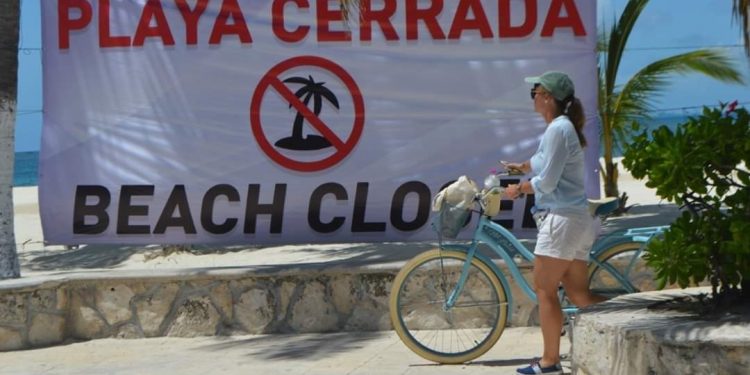 ANTE EL SEMÁFORO ESTATAL EN NARANJA LAS PLAYAS DE ISLA MUJERES SIGUEN CERRADAS