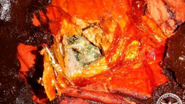 LA GUARDIA NACIONAL HALLA MARIGUANA ESCONDIDA EN BOTES CON MOLE