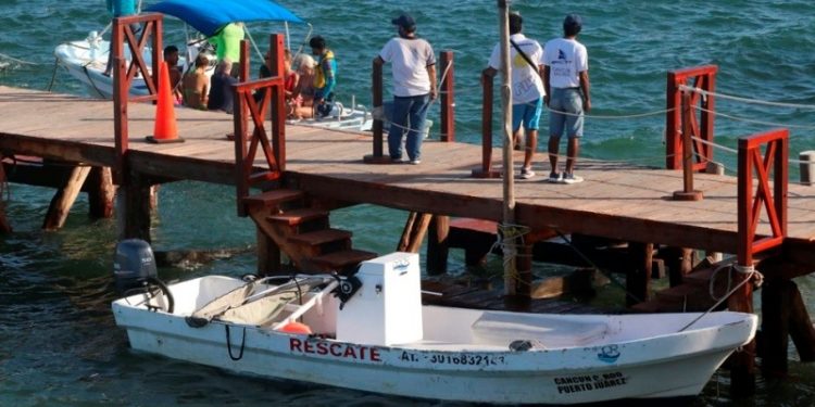 PESCADORES ENCUENTRAN CADÁVER FLOTANDO EN PUERTO JUÁREZ