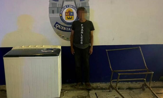 Detienen a ladrón con las manos en la lavadora