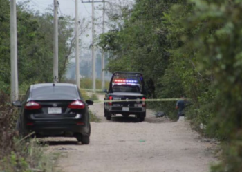 Hallan ejecutado envuelto en una sábana en Cancún