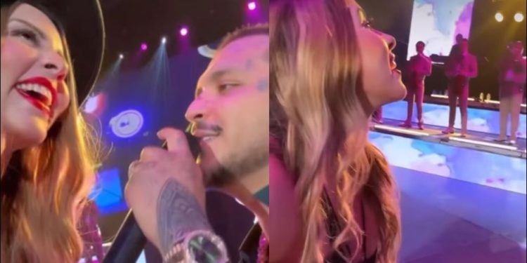 Christian Nodal subió al escenario a una joven parecida a Belinda y le canta al oído