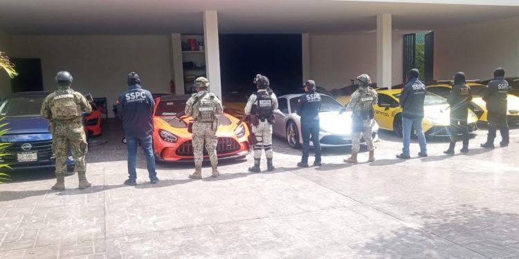 Decomisan autos de lujo en casa de empresario asesinado en Mérida; cateo estaría ligado al narcotráfico