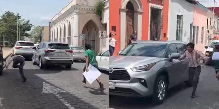 Activista sufre accidente tras intentar abordar vehículo donde presuntamente viajaba el gobernador May